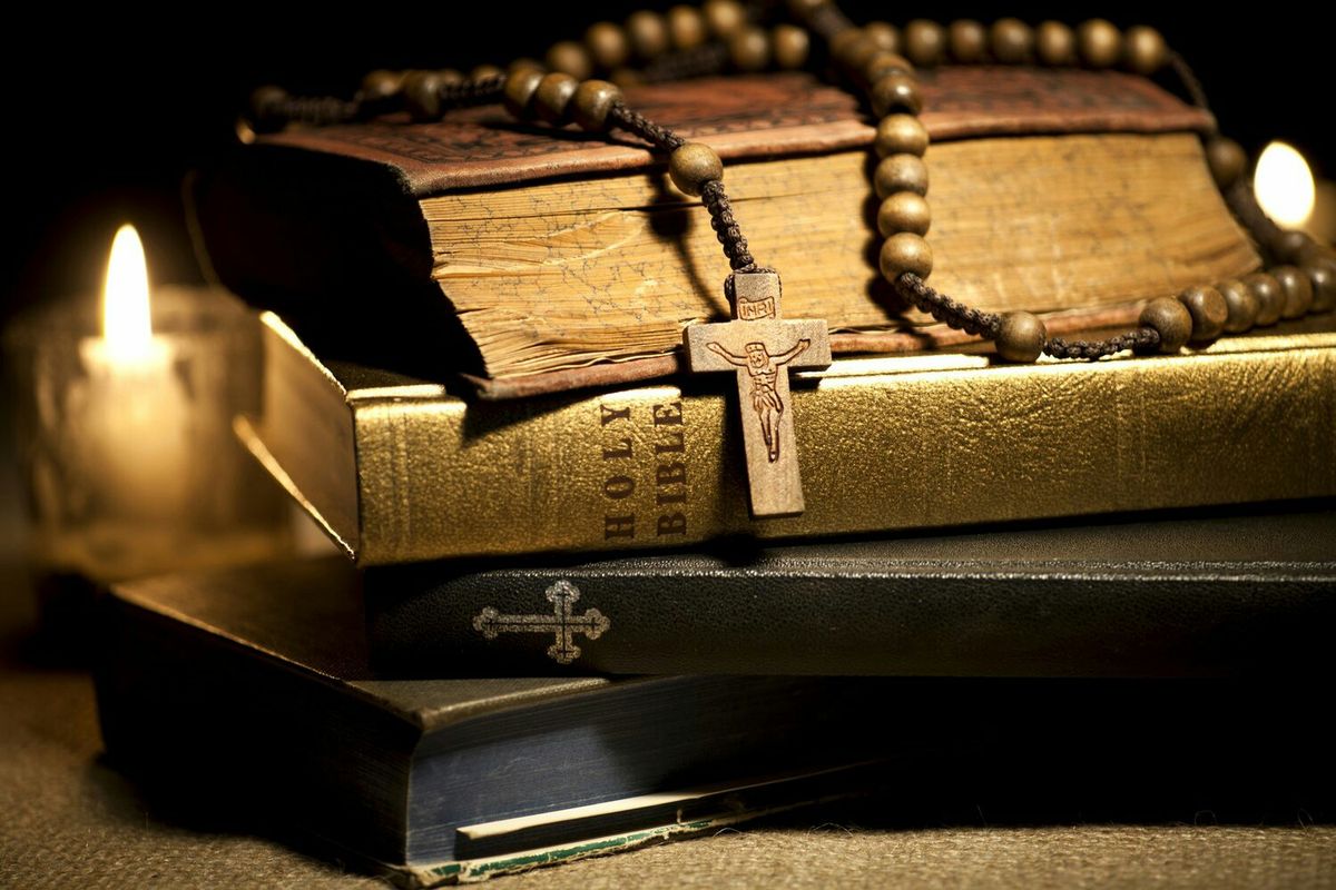 bible & books with rosary